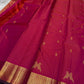 Rani Kili Butta Vairaoosi — Pure Silk Kanchipuram Saree
Rani-pink body with zari buttas & twin parrot motifs, antique-gold coin borders with emerald selvedge
Rich red-orange vairaoosi pallu with rosette brocade, matching blouse included
Silk Mark Cert