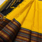 Marigold Mani Kattam – Pure Kanchipuram Silk Saree
Vibrant marigold yellow body with classic kattam checks
black borders with elephant & floral zari motifs
Rich black pallu adorned with green & zari stripes . Silk Mark Certified, delivery in 2 weeks
