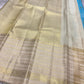 Blue Vennila Varisai – Pure Kanchipuram Silk Saree
Blue body with gold leaf buttas; contrast ivory varisai borders
Grand ivory pallu with rich zari stripes; contrast ivory blouse
Silk Mark Certified | Blouse Piece Included | Fall & Pico Done
Free Shipping