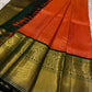 Gayatri ✨ – Fiery Orange Kanchipuram Pure Silk Saree
with All-Over Diamond Brocade & Paisley Buttas
Broad Bottle-Green Korvai Border in 3gms Pure Zari 🌿
Majestic Deep Green Pallu with Jaal & Vine Motifs
Silk mark zari certificate provided