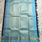 Moora – Handwoven Pure Kanchipuram Silk Saree in Deep Regal Purple with Lustrous Contrast Aqua Blue Border and Grand Pallu, Featuring Intricate Gold Zari Weaving with Traditional Round Medallions, Paisley Buttas, and Concentric Floral Vine Patterns