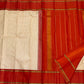 Ivory Vermillion Kattam — Pure Silk Kanchipuram Saree
Buttermilk-Ivory Body with Red Micro-Checks & Vermilion Korvai Border ✨
Gold Pin Lines, Leaf-Green Highlights & Rust Pallu • Silk Mark Certified • Ships in 1 Week ✅