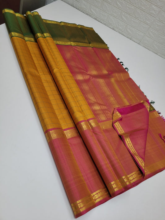Mubbagam - Pure silk kanchipuram Mubbagam - manthulir , subtle rustic and peach pink with a stunning rudhraksham and paisley border