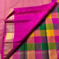 Pallavi – Kanchipuram Paalum pazhamum checks/ Zari kattam  Silk Saree in Turmeric, Mango, Leaf Green & Beetroot Pink Checks.
Finished with a vibrant magenta border and rich gold zari pallu.