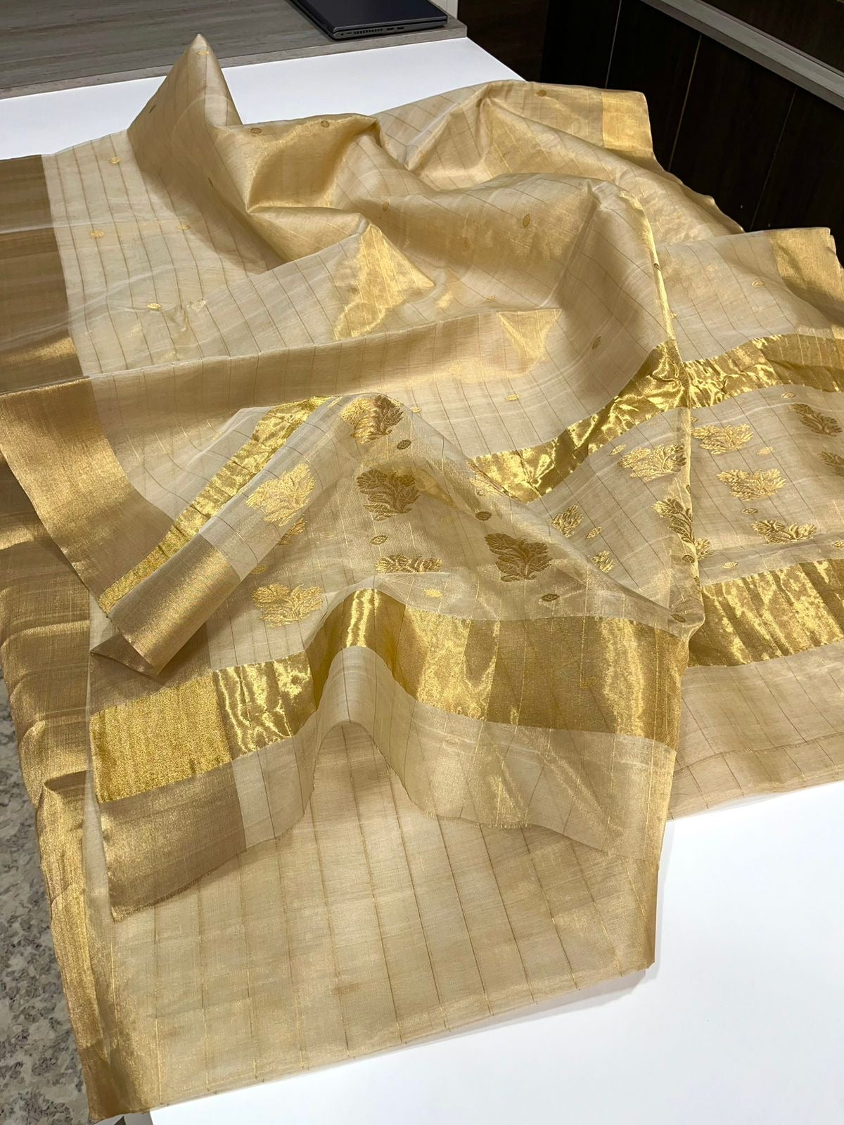 ✨ Pure Silk Chanderi Saree: Swarna Rekha (Champagne Gold Whisper)
Handwoven in luminous champagne-gold with zari buttas and pin-check texture ✨
Silk Mark Certified • Blouse Stitching Available ($30) • Free Shipping within USA • Ships in Two Weeks