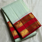 Scarlet Mist ✨ – Pastel Mint Vairaoosi Kanchipuram Pure Silk Saree
Korvai Scarlet-Red Border with Rich Zari Vines & Green Selvedge
Grand Red Pallu with Traditional Bird Buttas & Brocade Panels
Contrast Red Blouse fabric