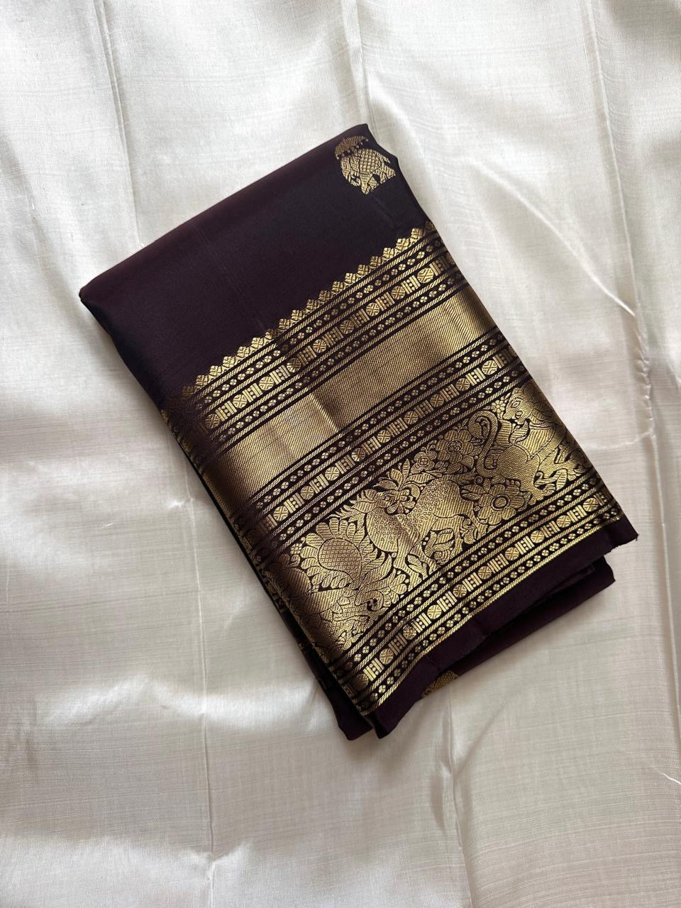 Plum silk saree with heritage gold zari border and pallu