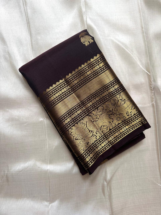 Plum silk saree with heritage gold zari border and pallu