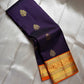 Jamun Purple Kesar – Korvai Kanchipuram Pure Silk Saree

Regal jamun-purple body adorned with antique-gold floral buttas

Kesari-orange korvai border with chakra roundels, vines & chevron zari

Free shipping withinUSA silk mark certified ships in 2 weeks