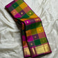 Pallavi – Kanchipuram Paalum pazhamum checks/ Zari kattam  Silk Saree in Turmeric, Mango, Leaf Green & Beetroot Pink Checks.
Finished with a vibrant magenta border and rich gold zari pallu.