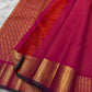 Rani Kili Butta Vairaoosi — Pure Silk Kanchipuram Saree
Rani-pink body with zari buttas & twin parrot motifs, antique-gold coin borders with emerald selvedge
Rich red-orange vairaoosi pallu with rosette brocade, matching blouse included
Silk Mark Cert