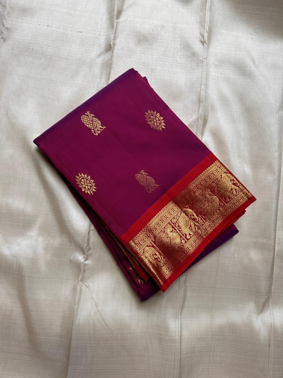 Swaram Lightweight – Berry Pink Purple
Feather-Light Berry Kanchipuram Silk Saree
Red Borders & Elephant Procession Zari