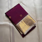 Varuni — Deep Purple & Magenta Shot Kanchipuram Silk Saree
Gold Zari Peacock Motifs on Luxurious Pure Silk
Antique Gold Korvai Border with Gandaberunda Design
Intricate Temple-Inspired Pillayar Moggu Detailing
Silk mark certified