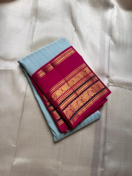 Orchid Sky ✨ – Pure Kanchipuram Silk Saree in Sky-Blue with Vertical Zari Stripes
Korvai Contrast Magenta Varisaipet Border & Grand Gold Zari Pallu
Contrast Magenta Blouse Piece with Matching Zari Border Attached
Silk Mark Certified | Fall & Pico Done |