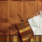 Parakkum Kili — Ivory Pure Silk Kanchipuram

Ivory body with fine zari coin buttas ✨
Rust-orange korvai borders with mayil & temple motifs 🌸
Grand rust-orange zari brocade pallu with tassels 🪔
Silk Mark Certified • Free Shipping USA • Ships in Two Weeks