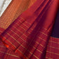 Poornima Kalyani
Deep Purple & Vermilion Kanchipuram Silk Saree
Zari Buttas · Checkered Borders · Silk Mark Certified