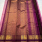 Rose Mist Zari Kattam — Kanchipuram Pure Silk

Blush rose-pink body with micro kattam (checks) in zari & scattered soorya-chakram buttas

Contrast mulberry purple korvai borders with rich gold zari detailing

Free shipping within USA silk mark certified