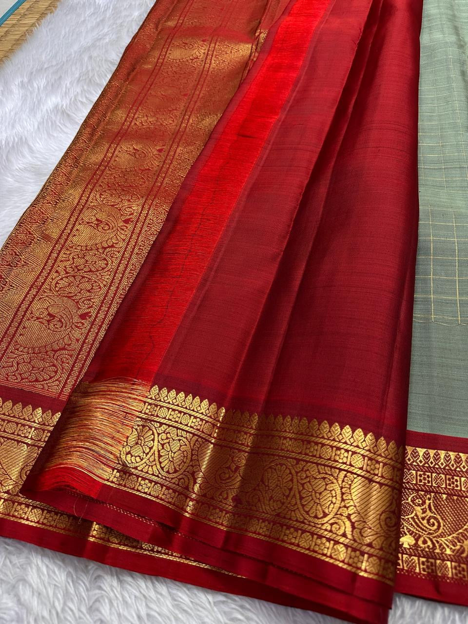 Sorgavaasal Kili , stunning motif in  golden dove grey and red zari kattam zari woven yazhi buttas in pure silk kanchipuram