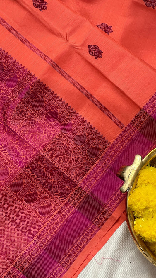 Peach pure Kanchipuram silk saree with purple silk thread weaving and no-zari thazhampoo border
