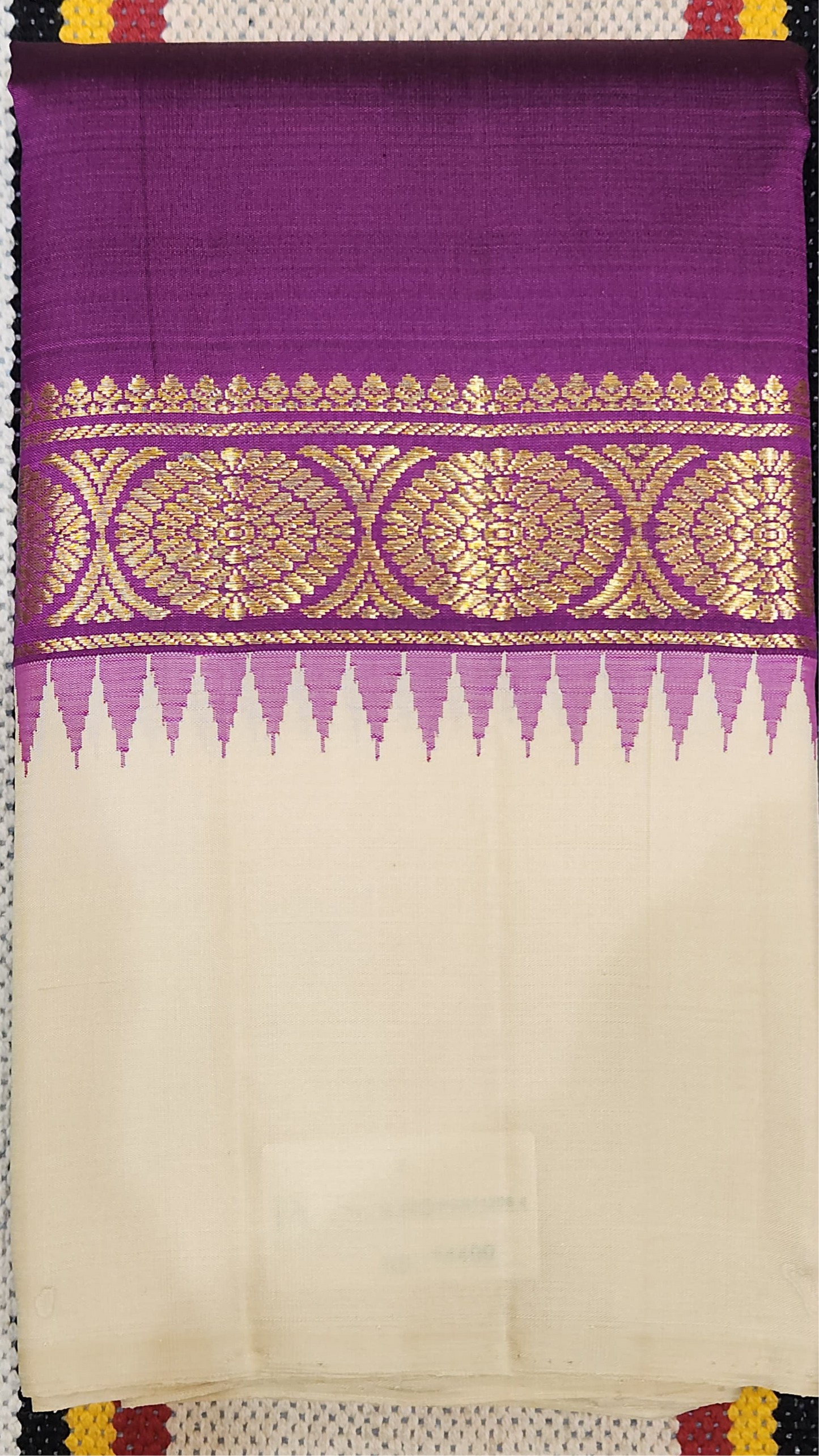 Ivory Plum ✨ – Pure Kanchipuram Silk Saree
Ivory Silk Body with Smooth Finish
Plum-Purple Contrast Border with Gold Zari Motifs
Temple-Inspired Edging & Rich Plum Pallu

Silk Mark Certified, delivery in 2 weeks