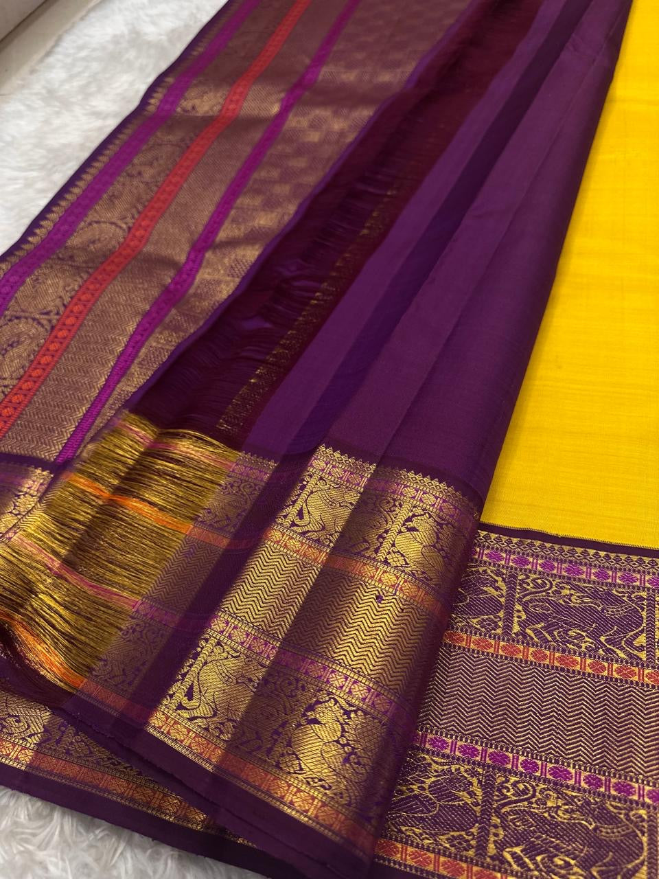 Golden Yellow and Purple Handwoven Pure Silk Kanjivaram Saree with Korvai Border and Kudhirai Butta