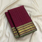 Handwoven Arakku pure silk Kanjivaram saree with plus-shaped zari buttas