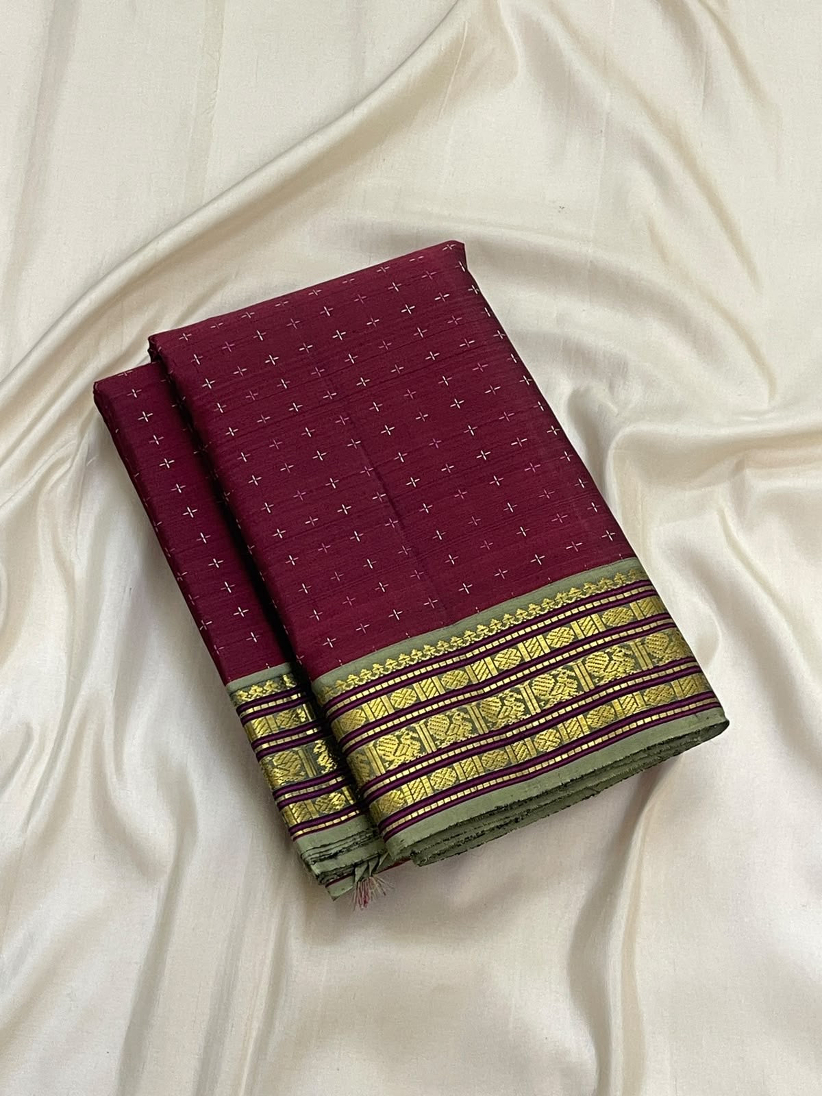 Handwoven Arakku pure silk Kanjivaram saree with plus-shaped zari buttas