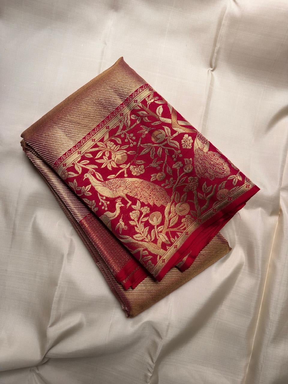 Champagne beige handwoven Pure Silk Kanchipuram Butta saree with crimson zari border