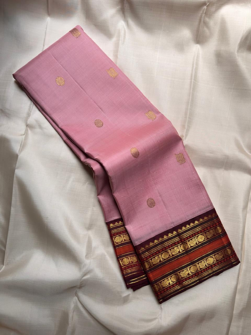 Petal pink Pure Silk Kanjeevaram Varisaipet saree with deep Arakku border