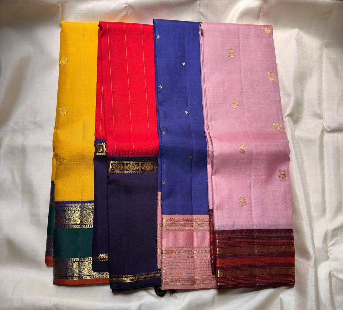 Deep indigo border with Rudraksham zari motifs