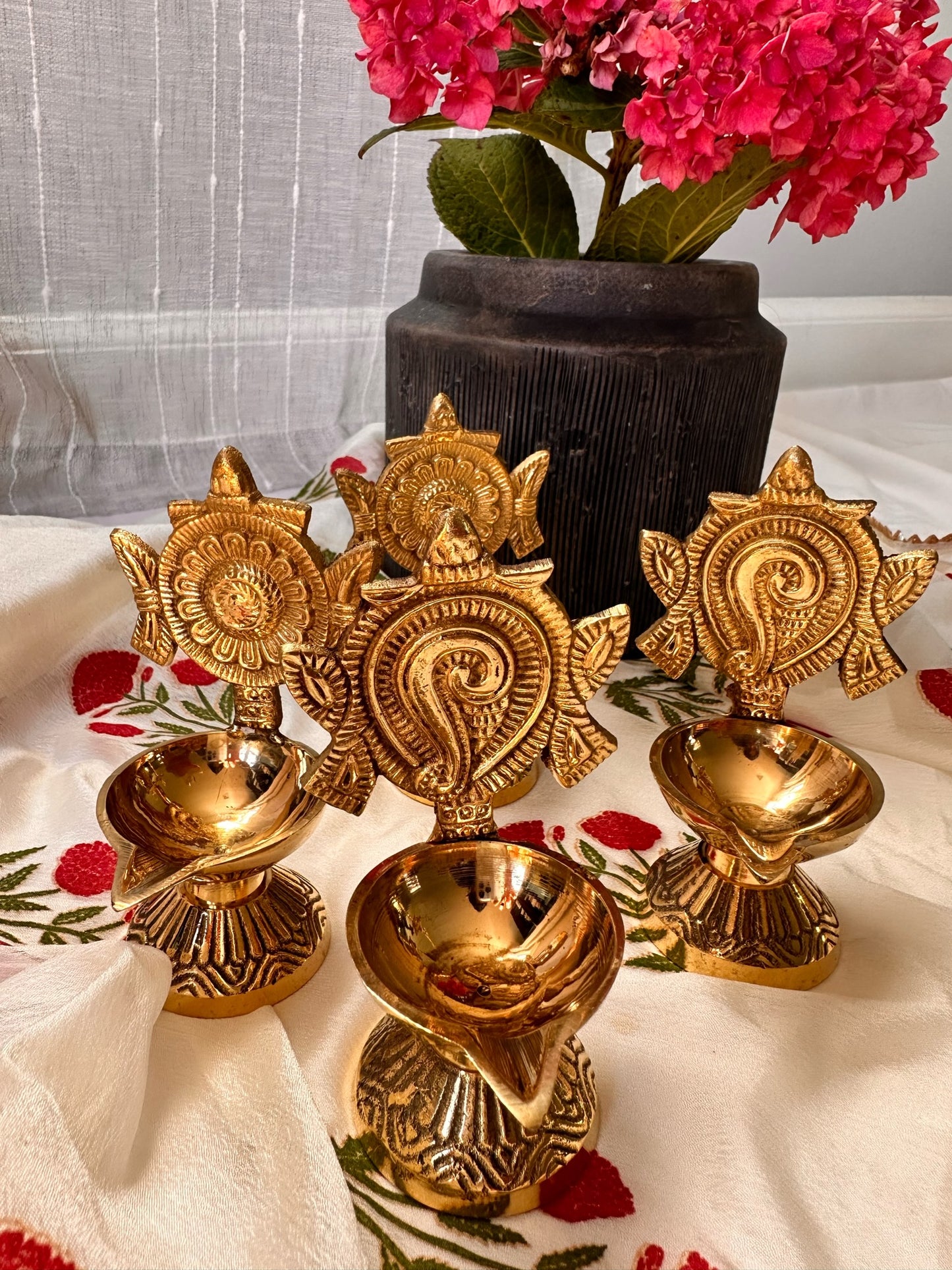 Brass shankh chakra diya (pair)