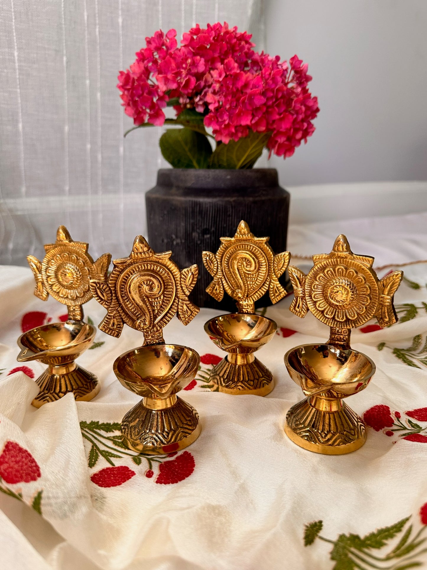 Brass shankh chakra diya (pair)