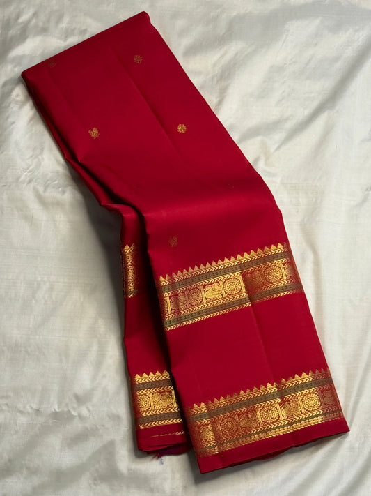 Vermilion Red handwoven pure silk Kanjeevaram Rettapet saree with gold zari buttas and traditional zari borders.