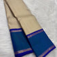 Ivory and Peacock Blue Handwoven Pure Silk Kanchipuram Saree with Kanchi Kattam Body and Rettapet Border