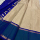 Ivory and Peacock Blue Handwoven Pure Silk Kanchipuram Saree with Kanchi Kattam Body and Rettapet Border