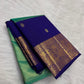Close view of the tissue silk body showing mint green with gold shimmer and royal blue section with scattered oval gold butta