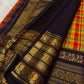 Full folded view of multicolour Kancheepuram Varisaipet saree showing check body and forest green border