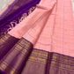 Close-up of radiant pink silk body with fine gold Zari Kattam grid and Kamalam Butta — Kancheepuram saree