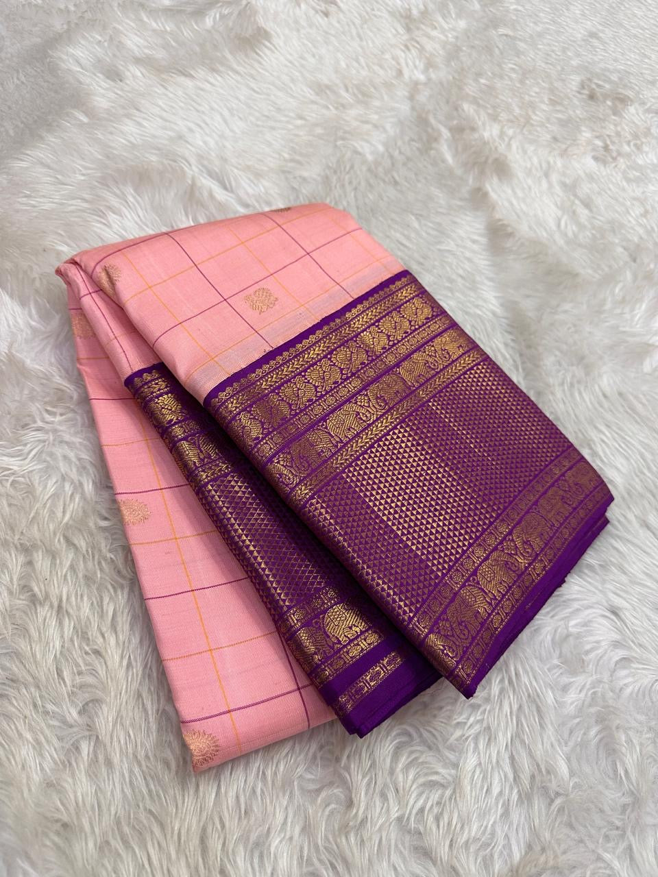 Heavy antique gold zari pallu with figural motifs on deep purple ground — Kancheepuram Zari Kattam silk saree