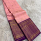 Full folded view of radiant pink Kancheepuram Zari Kattam saree showing Kamalam body and deep purple border
