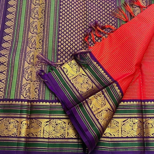 Antique gold Mayil and Yazhi figural pallu on purple-green silk thread ground — Kancheepuram Butta saree