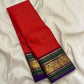 All-over dense fine gold zari butta diagonal pattern on deep red silk — Kancheepuram Butta body close-up