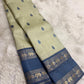 Handwoven pure silk Kancheepuram saree in pale gold with Silk Thread Teardrop Butta in steel blue and Rettapet Yaanai border in gold zari — Idam Living