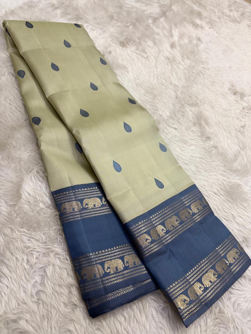 Handwoven pure silk Kancheepuram saree in pale gold with Silk Thread Teardrop Butta in steel blue and Rettapet Yaanai border in gold zari — Idam Living