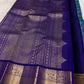 Deep violet Kancheepuram saree border with dense antique gold zari Yaanai elephant procession and scrolling floral forms — handwoven pure silk Idam Living