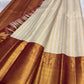 Close-up of ivory silk body with ornate all-over gold zari weave — Kanchi Pattu Butta saree body detail
