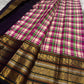 Gold zari pallu with Yaanai Butta figural motifs on forest green ground — Kanchi Pattu saree