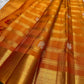 Maanga Butta mango motif in silver and gold zari within Zari Kattam grid — Kanchipuram Veldhari close-up