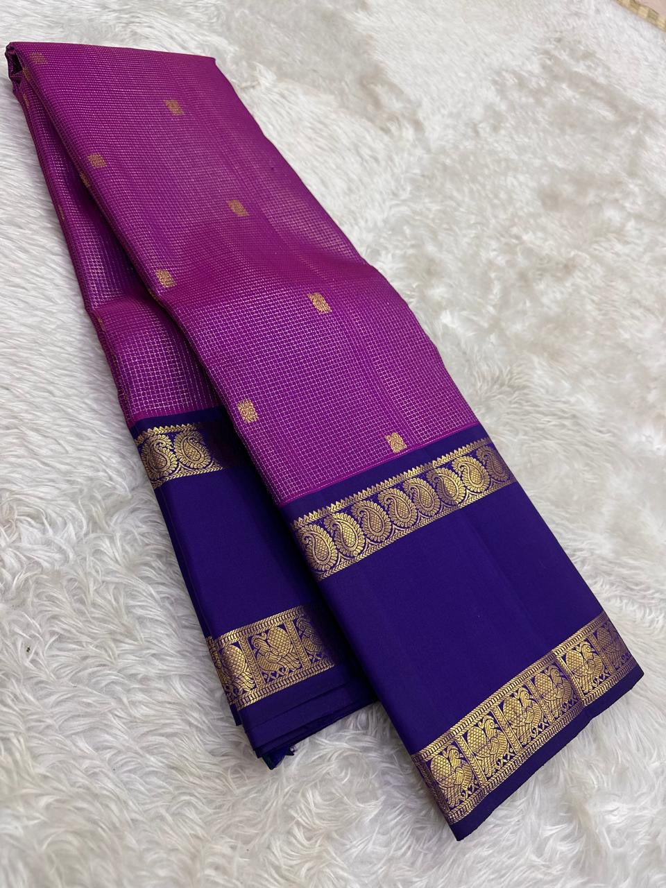 Magenta and violet handwoven pure silk Kanchi Pattu saree with Zari Kattam body and Rettapet Paisley Peacock border — full folded overview