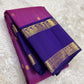 Close-up of magenta Zari Kattam silk body showing fine intersecting gold zari grid and scattered Maanga buttas on pure silk Kanchi Pattu saree